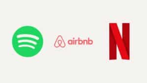 Collage aus den Logos von Spotify, Airbnb und Netflix auf hellem Grund