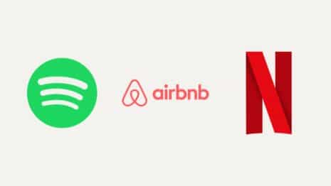 Collage aus den Logos von Spotify, Airbnb und Netflix auf hellem Grund
