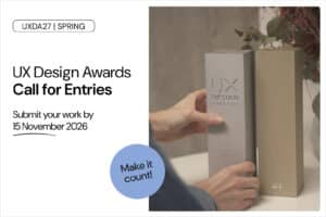 Grafik zur Ausschreibung der UX Design Awards Spring 2027 mit zwei Award-Stelen und dem Hinweis auf die Einreichfrist am 15. November 2026